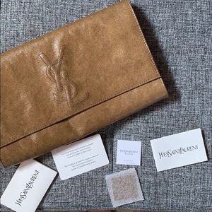 Yves Saint Laurent parent leather clutch